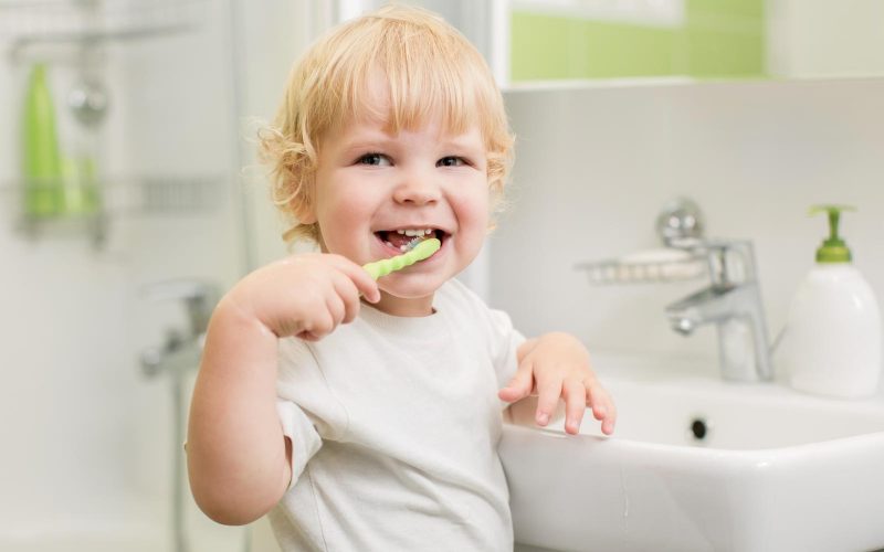 http://www.dreamstime.com/stock-photo-happy-kid-brushing-teeth-bathroom-bath-image33736330