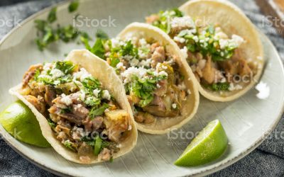 Homemade Pork Carnitas Tacos with Cilantro and Cojita